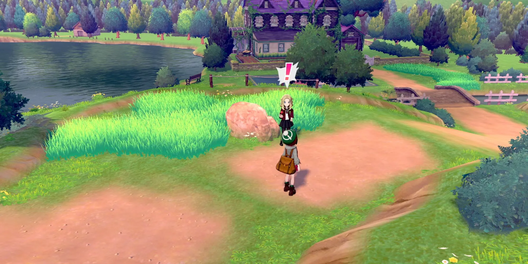 Huấn luyện viên Pokémon Sword and Shield đi trên một con đường ở Galar