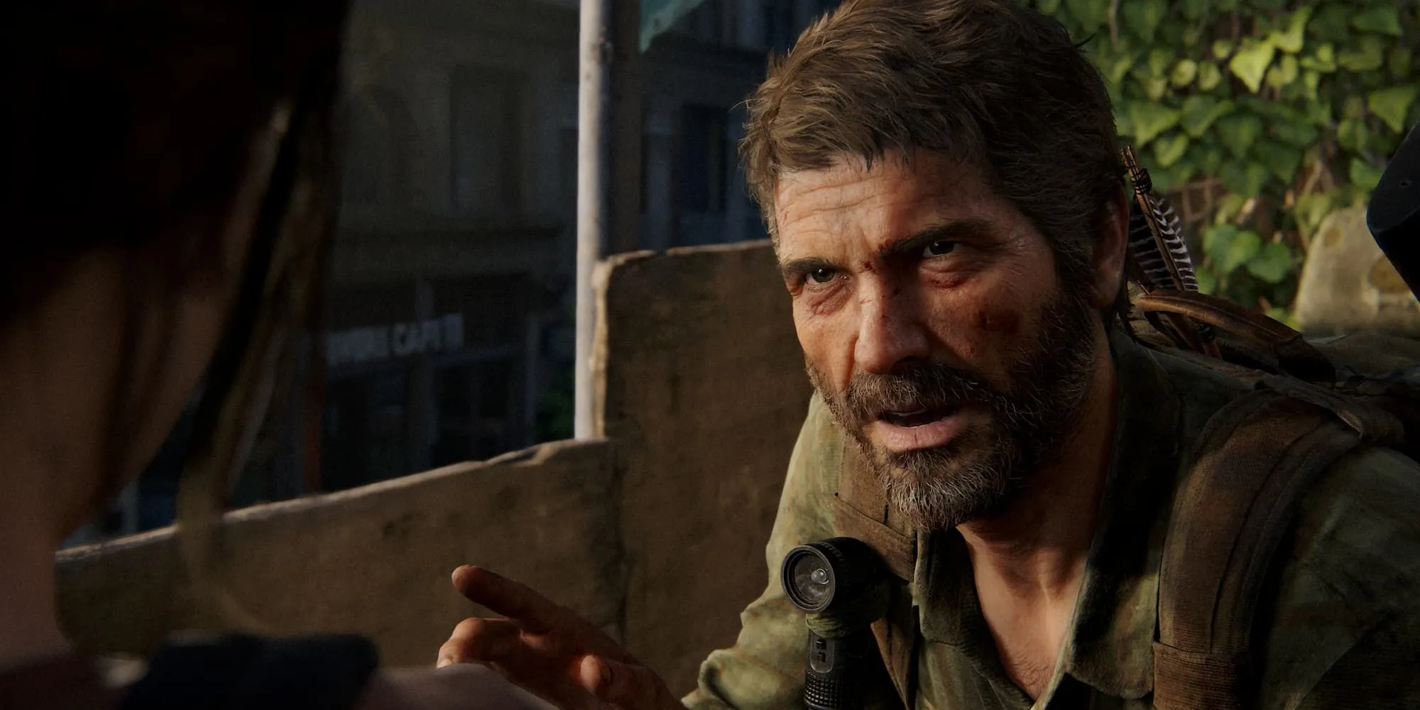 Joel đang nghiêm khắc nói chuyện với Ellie trong The Last of Us Part 1 trên PS5