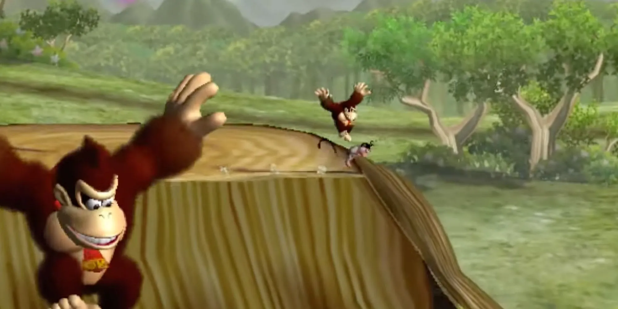 Donkey Kong đang nhảy múa sôi động trong Donkey Kong Jungle Beat trên GameCube, game dùng bộ điều khiển Bongos độc đáo.