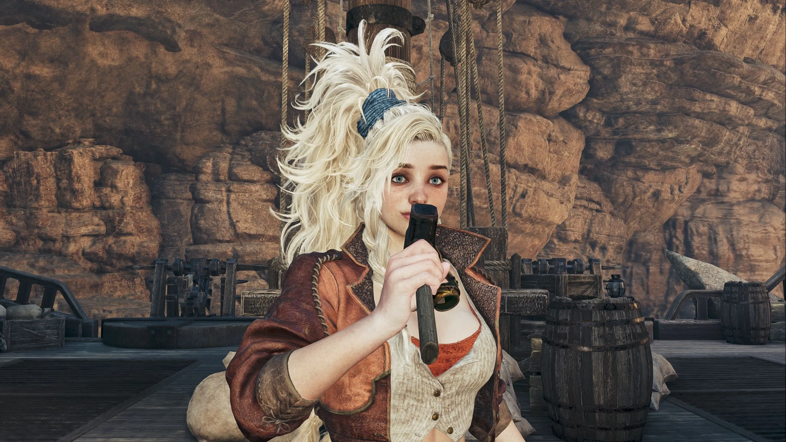 Gemma, người tổ chức sự kiện Flamefete, đang cầm búa như mic trong Monster Hunter Wilds, biểu tượng cho không khí sôi động của lễ hội.
