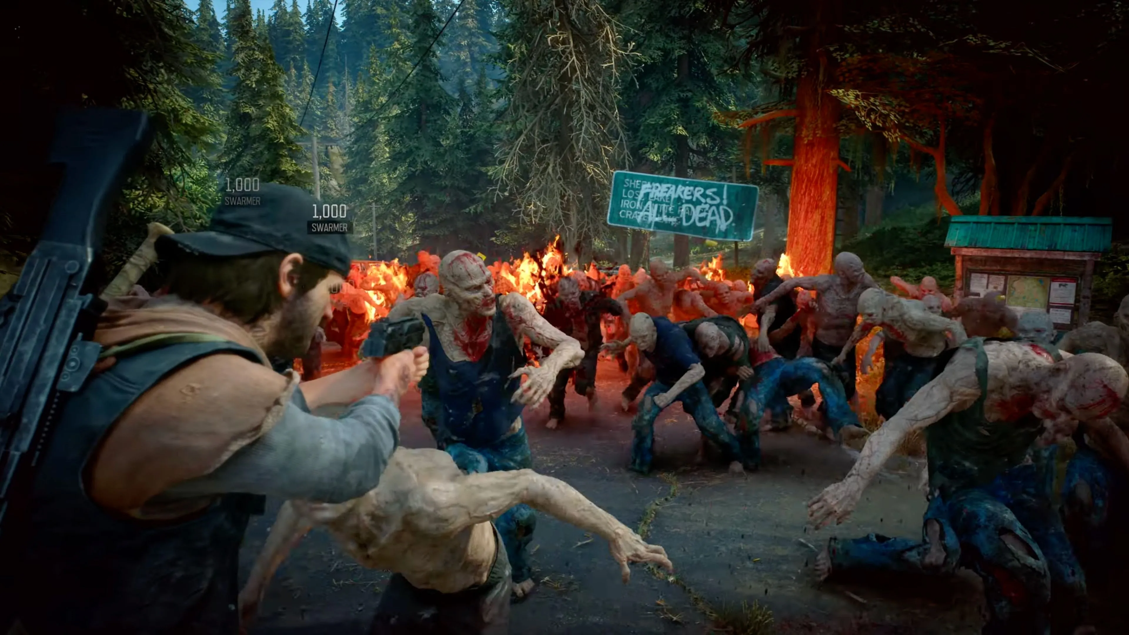Mô tả hình ảnh cận cảnh Deacon St. John trong Days Gone Remastered, lái xe mô tô giữa khung cảnh hoang tàn đầy zombie
